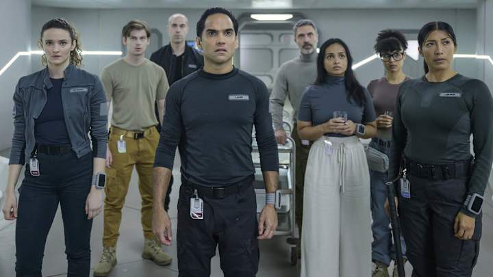 THE ARK -- "We Dont Kill Our Own" Episode 208 -- Pictured: (l-r) Christie Burke as Lt. Sharon Garnet, Ryan Adams as Angus Medford, Pavle Jerinic as Felix Strickland, Reece Ritchie as Lt. Spencer Lane, Jadran Malkovich as Dr. Marsh, Shalini Peiris as Dr. Sanjivni Kabir, Stacey Read as Alicia Nevins, Diana Bermudez as Kimi -- (Photo by: Aleksandar Letic/Ark TV Holdings, Inc./SYFY)